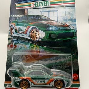 Mattel 7-Eleven Racing Car with Green and Orange Accents